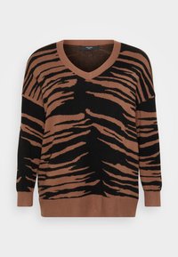 Pull en maille douce à rayures marron et noir, avec un col en V et une coupe décontract�ée, complété par des poignets et un ourlet côtelés.