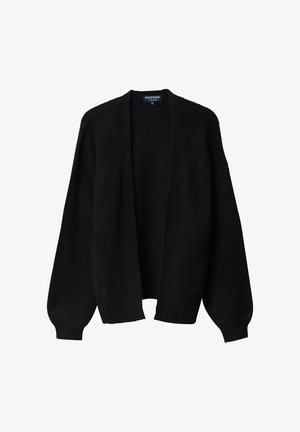 Musta, avointa etuosaa oleva neuletakki pehmeästä, teksturoidusta kankaasta. Siinä on pitkät, leveät hihat ja ribbaus hihansuissa. Yksinkertainen muotoilu ilman koristeita.