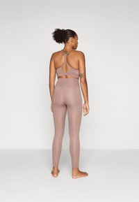 New Balance HARMONY HIGH RISE  - Leggings - earth shadow