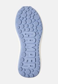 Sole of a blue shoe featuring textured circular patterns and the brand name "GAMPER" prominently displayed in the center. Size 38 indicated.