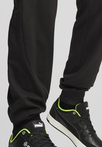 Puma MERCEDES-AMG PETRONAS F1 CLOUDSPUN - Tréningruha alsók - black