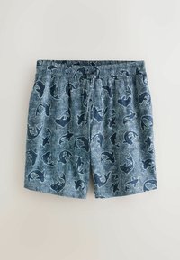 Kék fürdőnadrág sötét halmintával és fehér örvénylő vonalakkal, elasztikus derékpánttal és elöl húzózsinórral.