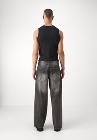 Jaded London WASHED STUD COLOSSUS - Laisvi džinsai - black