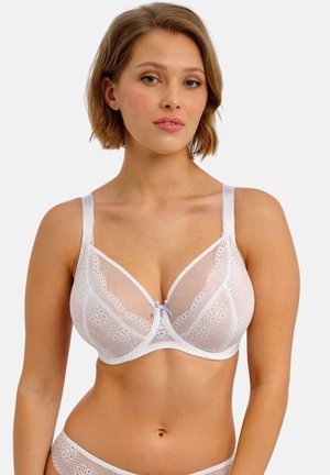 Weißer Spitzen-BH mit transparenten Einsätzen, floralen Mustern und einer Satinschleife in der Mitte, verstellbaren Trägern und einem glatten Bund.