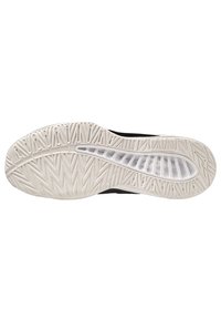 Suela de zapato atlético negro con un dibujo de goma blanca texturizada que presenta un patrón de espiga y un recorte transparente para amortiguación.