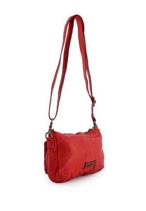 Red leather crossbody bag with adjustable strap, zipper closure, and small brand patch on the front.