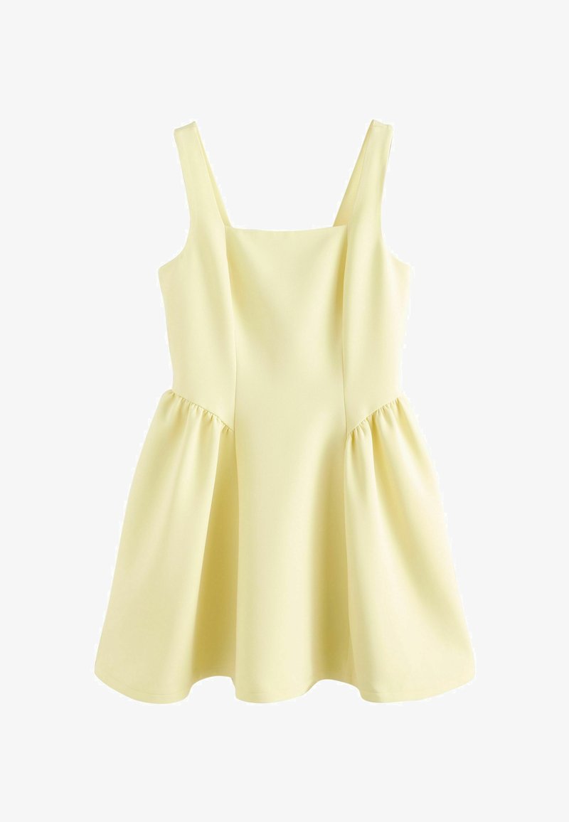 Robe jaune pâle sans manches avec encolure carrée et jupe évasée plissée, présentée à plat sur un fond blanc.