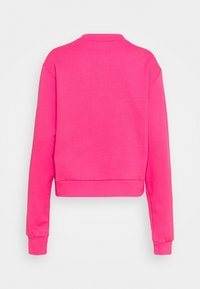 Růžová krátká mikina s dlouhými rukávy, žebrovanými manžetami a kulatým výstřihem. Vyrobená z měkké látky s hladkým povrchem.