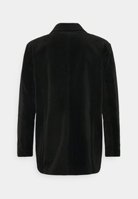 Černé manšestrové sako s dlouhými rukávy, klopami s výstřihem do V a svislou žebrovanou strukturou. Čistý zadní design bez kapes a ozdob.