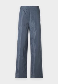 Weite Hose in Dunkelgrau, aus glattem Stoff. Verfügt über zwei Fronttaschen und gestickte Details entlang der Nähte.