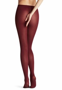 Collant bordeaux realizzati in un materiale opaco e elasticizzato, con un design senza cuciture che copre le gambe, caratterizzati da una texture morbida e senza motivi visibili.