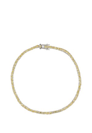 Silver tennis bracelet with alternating yellow and clear round gemstones and a box clasp closure.