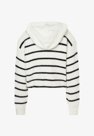 Hoodie court rayé en matière blanche et noire duveteuse, avec capuche, manches longues et rayures noires horizontales.