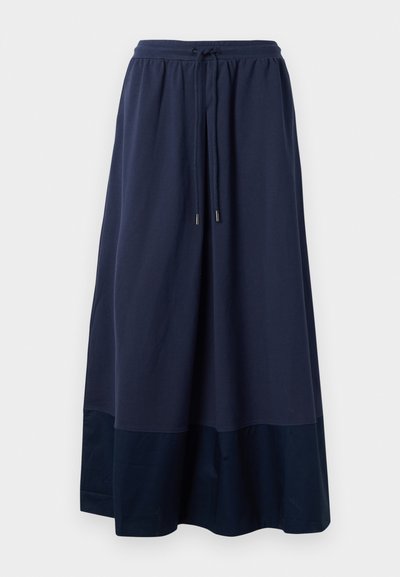 Navyblaue Maxirock aus weichem Stoff, mit einem elastischen Bund und einem Kordelzug sowie einem dunkleren blauen Besatz am Saum.