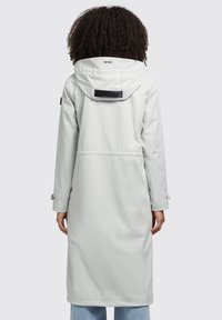 Light gray, long raincoat with a hood, adjustable cuffs, and a black logo accent on the back. Smooth texture and waterproof material.
