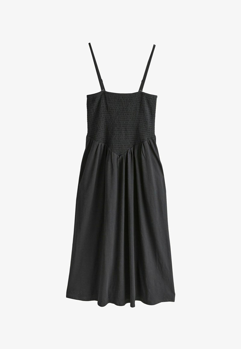 Rochie neagră cu bretele subțiri reglabile, corset cu pliuri și fustă fluidă. Confecționată dintr-un material fin, cu o croială relaxată și detalii strânse.