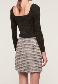 Motivi Stickad tröja - black