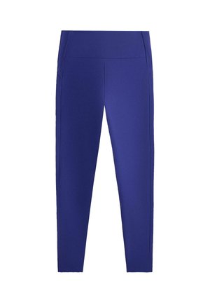 Modre legice z visokim pasom, gladkim pasom in ozkim krojem, ki segajo do gležnjev, prikazane na belem ozadju.