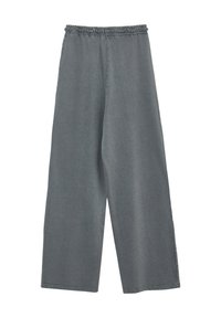 Pantalons gris à jambes larges avec une taille élastiquée, fabriqués en un tissu texturé doux. Présentent une silhouette droite et des coutures minimales.