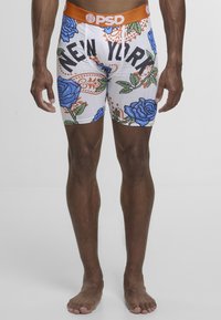 Hvite boxer briefs med blå rosedekor og grønne blader, med oransje midjebånd med "PSD"-logo og teksten "NEW YORK" foran.