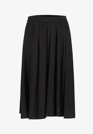 Gonna nera in jersey, lunghezza fino al ginocchio, con una vita elastica, caratterizzata da una silhouette fluida e una texture morbida e leggera. Nessun motivo o accessorio.