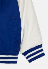 Tommy Hilfiger HOODED GRAPHIC - Übergangsjacke - wedge blue