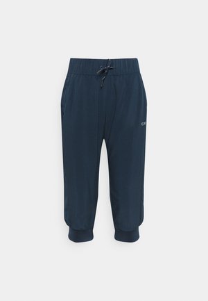 Navy blue cropped pants with elastic waistband, adjustable drawstring, loose fit, elastic cuffs, and small white logo on right thigh.