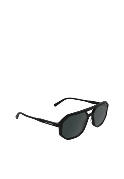 Lunettes de soleil noires octogonales avec verres foncés, présentant un design géométrique audacieux, fabriquées en plastique léger. Logo sur les branches.
