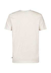 Kortærmet t-shirt i lys beige med røde sprøjtede mønstre, rund hals, blødt bomuldsstof, med et lille logo på den nederste side.
