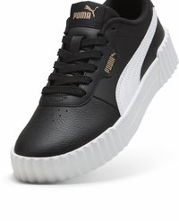 Czarne skórzane sneakersy z białym paskiem po boku i elastyczną białą podeszwą z rowkami. Posiadają czarne sznurowadła oraz złote logo na języku.