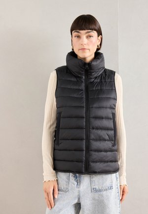 WELT POCKETS - Waistcoat - black