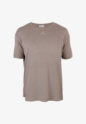 Rövid ujjú, taupe színű, kerek nyakkivágású póló, amelyen a nyakvonal alatt középen egy kis "KLEINIGKEIT" logó található.