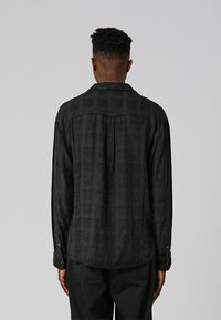 Former VIVAN CRUX BLUR - Majica - black