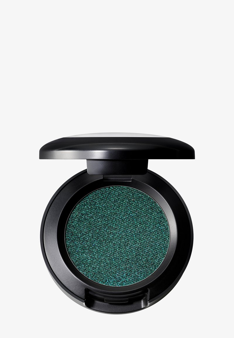 Black compact with a rounded shape containing green shimmery eyeshadow. The texture is sparkly, and the lid is smooth with a glossy finish.