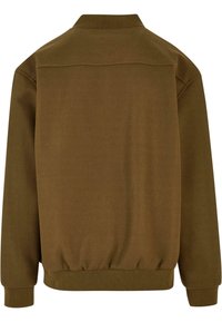 Veste marron à manches longues avec poignets ajustés, taille élastique et col droit vue de dos.