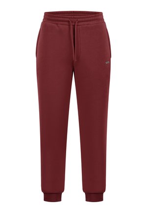 Pantaloni jogger bordeaux con vita elasticizzata e cordino. Polsini a costine alla caviglia. Tessuto morbido con una consistenza liscia.