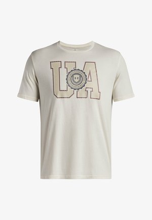 Light beige cotton t-shirt featuring "UA" graphic in dark brown and blue accents, with round emblem detail in the center. Short sleeves.