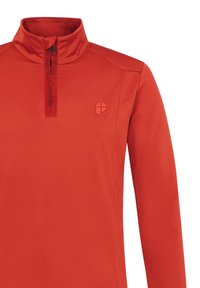 Punainen neulepaita, jossa on korkea kaulus, vetoketjusuljenta ja kohokuvioitu logo. Valmistettu sileästä, kevyestä materiaalista ja saumattomasta muotoilusta.