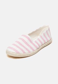 Pink and white striped espadrille with a canvas upper and a jute rope sole. Features a slip-on design and rounded toe.