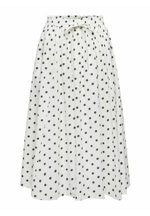 Witte midi-rok met zwarte polkadots, elastische tailleband en een strik aan de voorkant, vloeiende stof en lichte plooien.