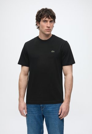 Lacoste, T-shirts - black