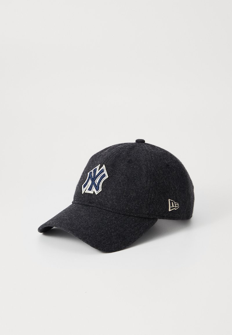 Dark grey wool cap with an embroidered white and blue New York logo on the front. Features a curved brim and stitched accents.