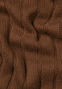 Brown knitted fabric with a wavy pattern. The texture is thick and soft, featuring prominent ribbing and a slightly raised weave.