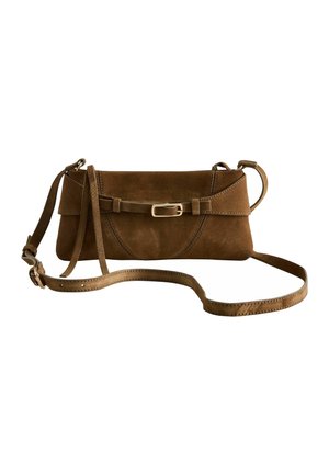 Brown suede crossbody bag with a slim rectangular shape, front strap with a small gold buckle, and adjustable shoulder strap.