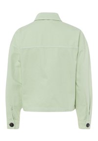 Giacca di cotone verde chiaro con colletto a revers, maniche lunghe con polsini abbottonati e design dritto sul retro.