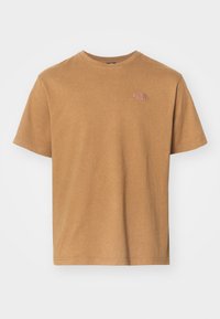 Braunes Baumwoll-T-Shirt mit Rundhalsausschnitt, kurzen Ärmeln und einem kleinen gestickten Logo auf der Brust. Weicher Stoff mit lockerer Passform.