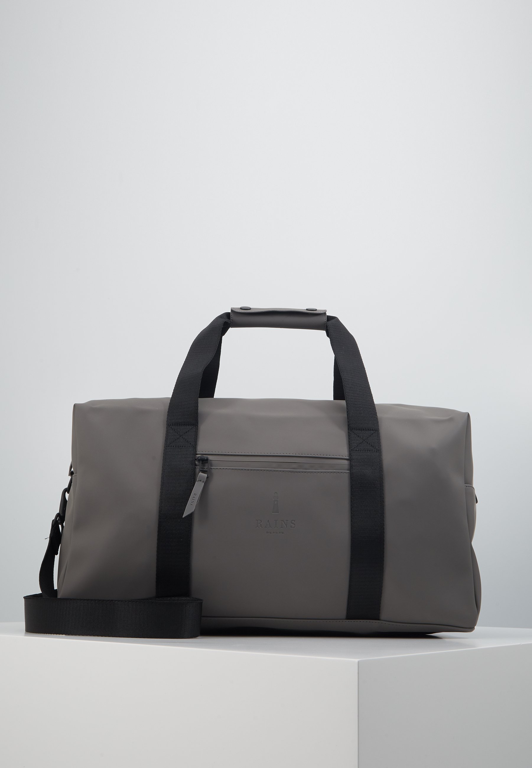 rains zip bolsa