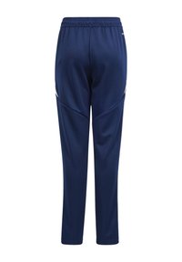 Marine treningsbukser laget av glatt stoff med elastisk midjebånd. Har tapered ben og kontrasterende hvite sidedele.