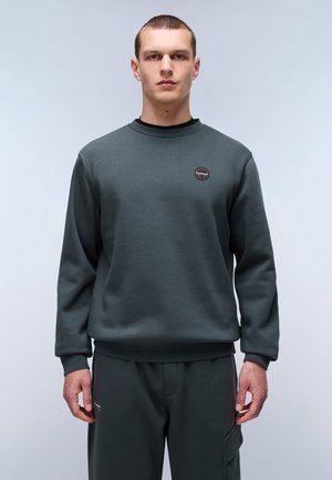 Donkergroene sweatshirt met een ronde hals, geribbelde manchetten en een klein logo-opdruk op de borst; geweven stof. Gepaard met bijpassende broek.