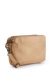 Tan leather clutch bag with a smooth texture, double zipper closure, and detachable strap. Features a minimalist design and no visible patterns.